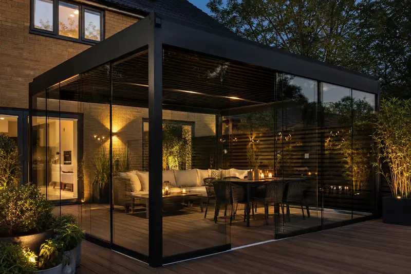 Black metal pergola with evening lighting